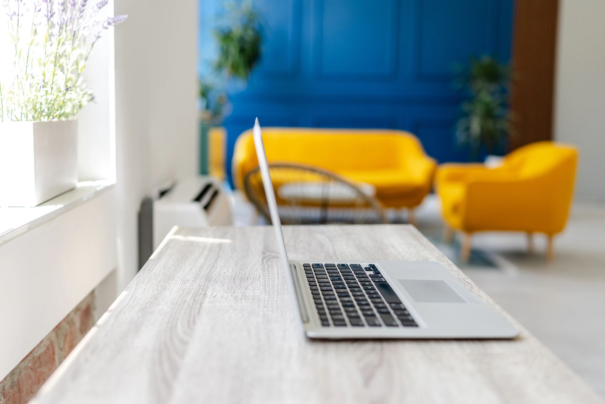 Modern desk workspace with laptop